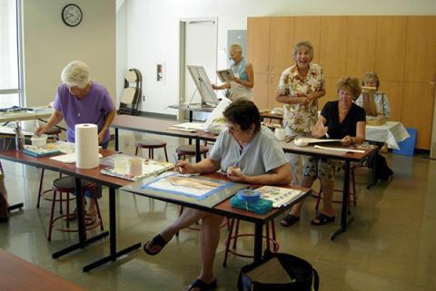 Seniors enjoying painting