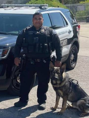 K9 Unit officer and dog team photo.