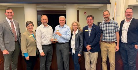 Group photo of the Atascadero City Council, the City Manager, and Public Works staff recognizing an award for the El Camino Real (ECR) Project during the March 10, 2026 City Council meeting.